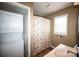Bathroom with shower stall, toilet, and stackable washer/dryer at 1111 & 1075 Turkey Creek Ridge Rd, York, SC 29745