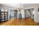 Bright dining room with hardwood floors and views into kitchen and living areas at 223 Adrian Rd, Salisbury, NC 28146