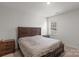 Spacious bedroom with king bed and dresser at 7805 Stonehouse Dr, Gastonia, NC 28056