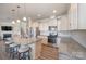 Spacious kitchen with granite countertops and island at 3057 Burnello Ct, Iron Station, NC 28080