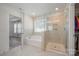 Elegant bathroom with soaking tub, walk-in shower, and double vanity at 3057 Burnello Ct, Iron Station, NC 28080