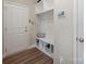 Inviting entryway with built-in bench and storage at 3057 Burnello Ct, Iron Station, NC 28080