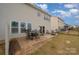 Brick patio with seating area and grill at 3057 Burnello Ct, Iron Station, NC 28080