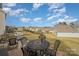 Backyard view of homes and landscaping at 3057 Burnello Ct, Iron Station, NC 28080