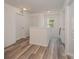 Upstairs hallway with doors to bedrooms and stairs at 3057 Burnello Ct, Iron Station, NC 28080
