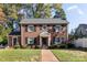 Brick two-story house with landscaped lawn and walkway at 404 Dale Ave, Gastonia, NC 28052