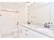 Bathroom with double vanity, granite countertop, and shower/tub combo at 201 Wedge View Way, Statesville, NC 28677