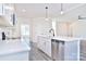Modern kitchen with stainless steel appliances and island at 201 Wedge View Way, Statesville, NC 28677