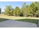 Concrete patio overlooking backyard at 201 Wedge View Way, Statesville, NC 28677