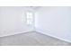 Bedroom with grey carpet and a window at 103 Bunker Hill Ln, Statesville, NC 28677