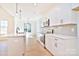 Modern kitchen with white cabinets and quartz countertops at 103 Bunker Hill Ln, Statesville, NC 28677
