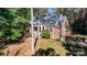 Brick home with large windows, a red front door, and a covered porch at 4100 Rainbow Hills Dr, Hickory, NC 28602