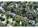 Aerial view of neighborhood with houses and trees at 6416 Red Maple Dr, Charlotte, NC 28277