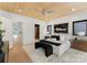 Bright bedroom with wood ceiling and ensuite bathroom access at 5447 Topping Pl # 102, Charlotte, NC 28209