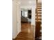 View of living room with fireplace and hardwood floors from entryway at 1102 Lane St, Kannapolis, NC 28083