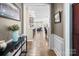 View through the entry hall to the kitchen and living areas at 233 Grovefield Dr, Fort Mill, SC 29715