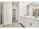 Modern bathroom with double vanity and large walk-in shower at 7403 American Elm Rd, Charlotte, NC 28215