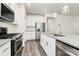 Kitchen with stainless steel appliances and granite countertops at 7403 American Elm Rd, Charlotte, NC 28215