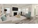 Virtually staged living room with fireplace and hardwood floors at 7403 American Elm Rd, Charlotte, NC 28215
