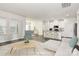 Virtually staged open concept kitchen and living area at 7403 American Elm Rd, Charlotte, NC 28215