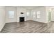 Living room featuring a fireplace and hardwood floors at 7403 American Elm Rd, Charlotte, NC 28215