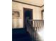 Classic wooden staircase with dark wood railing at 115 S Pearl St, Troy, NC 27371