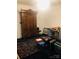Spacious bedroom with antique wardrobe and rug at 115 S Pearl St, Troy, NC 27371