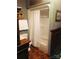 Small bathroom with shower and patterned wallpaper at 115 S Pearl St, Troy, NC 27371