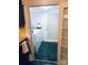 Bright laundry room with washer, dryer, and exterior access at 115 S Pearl St, Troy, NC 27371