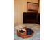 Cozy bedroom scene with book, coffee, and cherries on a tray at 115 S Pearl St, Troy, NC 27371