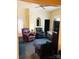 Relaxing living room featuring comfortable seating and a large TV at 115 S Pearl St, Troy, NC 27371