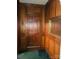 Entryway with wood paneling and ornate mirror at 115 S Pearl St, Troy, NC 27371