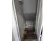 View of unfinished basement accessed via wooden stairs at 602 W Council St, Salisbury, NC 28144