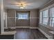 Dining room with hardwood floors and multiple windows at 602 W Council St, Salisbury, NC 28144