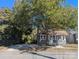 Quaint gray house with a tree-lined street at 602 W Council St, Salisbury, NC 28144