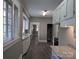View of kitchen, granite countertops, white cabinets, and hardwood floors at 602 W Council St, Salisbury, NC 28144