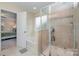 Bathroom features a soaking tub and a walk-in shower at 1988 Sapphire Meadow Dr, Fort Mill, SC 29715