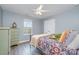 Bedroom with a full-size bed, dresser, and window with natural light at 1988 Sapphire Meadow Dr, Fort Mill, SC 29715