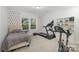 Basement bedroom with treadmill and stationary bike at 1988 Sapphire Meadow Dr, Fort Mill, SC 29715