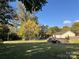 Large backyard with above ground pool and spacious lawn at 950 Polk St, Charlotte, NC 28206