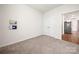 Versatile bedroom with closet and view of kitchen at 125 White Apple Way, Statesville, NC 28625