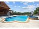 Inviting pool with a slide, hot tub and basketball goal at 3460 Jennings Rd, Union Grove, NC 28689
