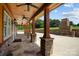 Covered patio with stone flooring and outdoor fireplace at 3460 Jennings Rd, Union Grove, NC 28689