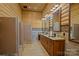 Clean bathroom with double vanity and multiple stalls at 3460 Jennings Rd, Union Grove, NC 28689