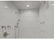 Large walk-in shower with tiled walls and built-in shelving at 3460 Jennings Rd, Union Grove, NC 28689