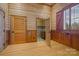 Charming bedroom with wood walls and an ensuite bathroom at 3460 Jennings Rd, Union Grove, NC 28689