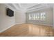 Spacious main bedroom with hardwood floors and a large window at 3460 Jennings Rd, Union Grove, NC 28689