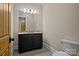 Convenient bathroom with single vanity and toilet at 3460 Jennings Rd, Union Grove, NC 28689