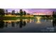 Scenic pond view with reflection of homes at sunset at 3460 Jennings Rd, Union Grove, NC 28689