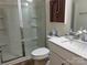 Modern bathroom with walk-in shower, toilet, and vanity at 12129 Storm Ln # 58, Charlotte, NC 28277